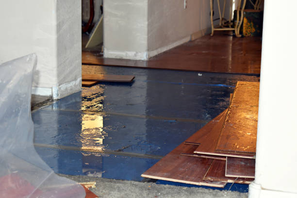 Professional Flood Damage Restoration technician working in Florence, OR